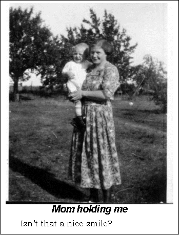 Text Box: Mom holding me
Isnt that a nice smile?
