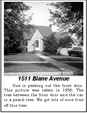 Text Box:  1511 Blane Avenue
Sue is peeking out the front door. This picture was taken in 1956. The tree between the front door and the car is a peach tree. We got lots of nice fruit off this tree.
